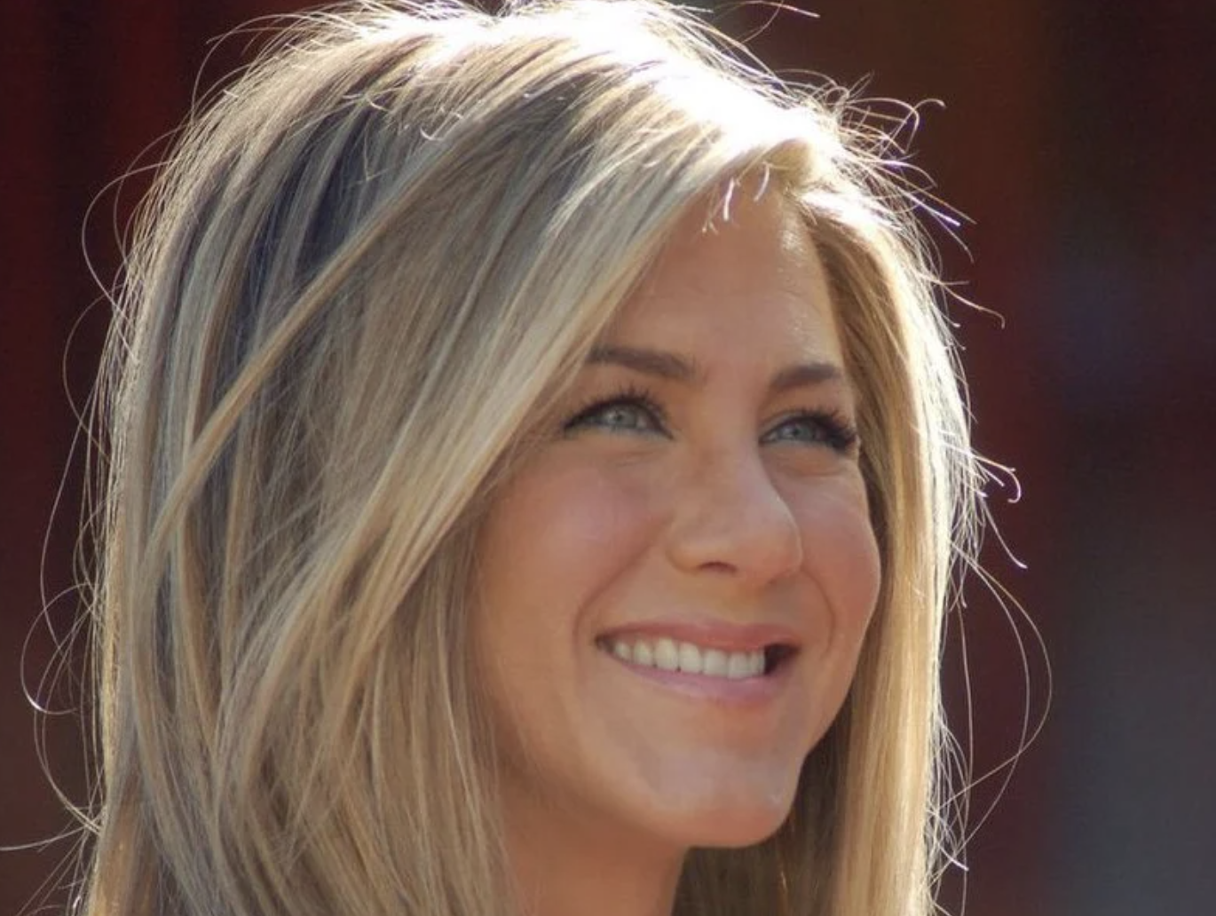 Smiling woman with blonde hair